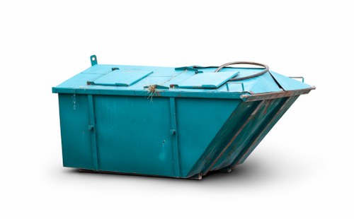 Company vehicle and workers preparing for commercial waste collection