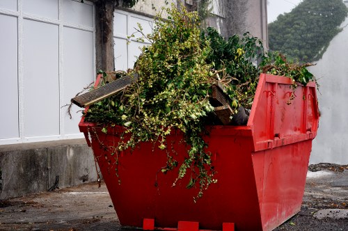 Garden debris being removed by Hoxton clearance professionals
